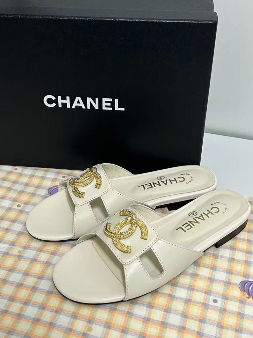 Chanel Ivory Slides: Where Timeless Design Meets Summer Comfort.